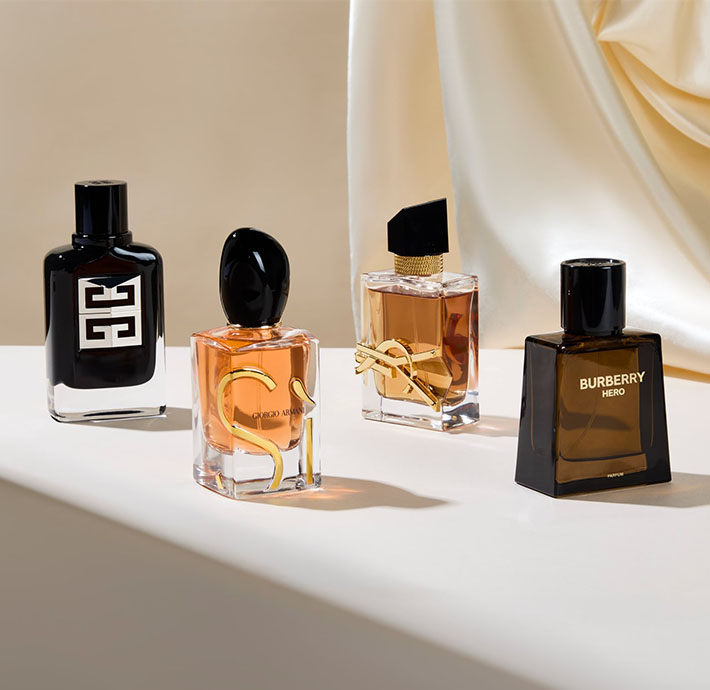 Fragrances lined up with cream background