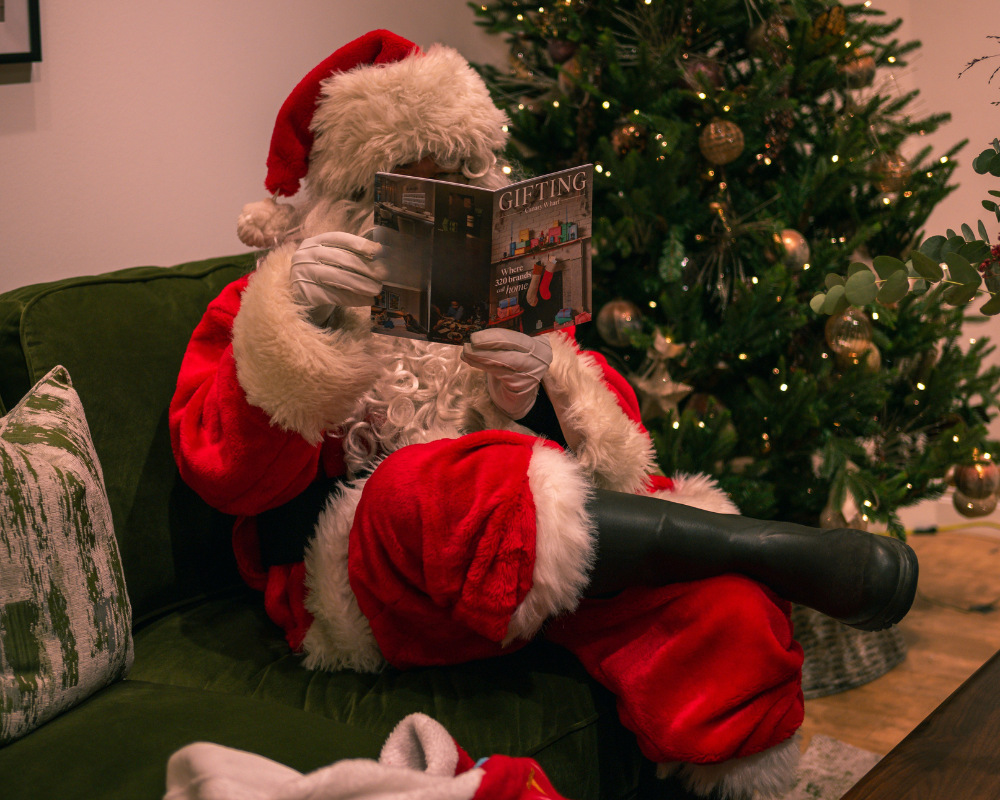 father christmas reading a magazine