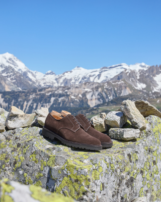 Brown shoes on mountain